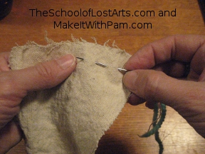 Two stitches on the needle.