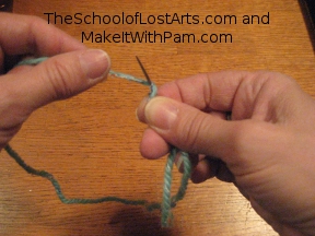 Wrap the thread around the needle 