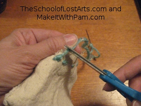 Cut the excess thread.