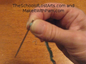 Pinch the folded thread